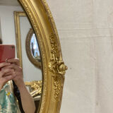 Miroir oval en bois doré 70x49cm