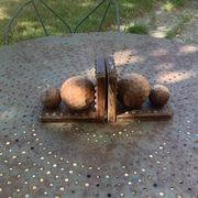 Pair of vintage carved wood and metal ball bookends