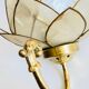 Vintage mother-of-pearl and brass flower wall light