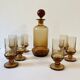 Art Deco liqueur set in amber glass