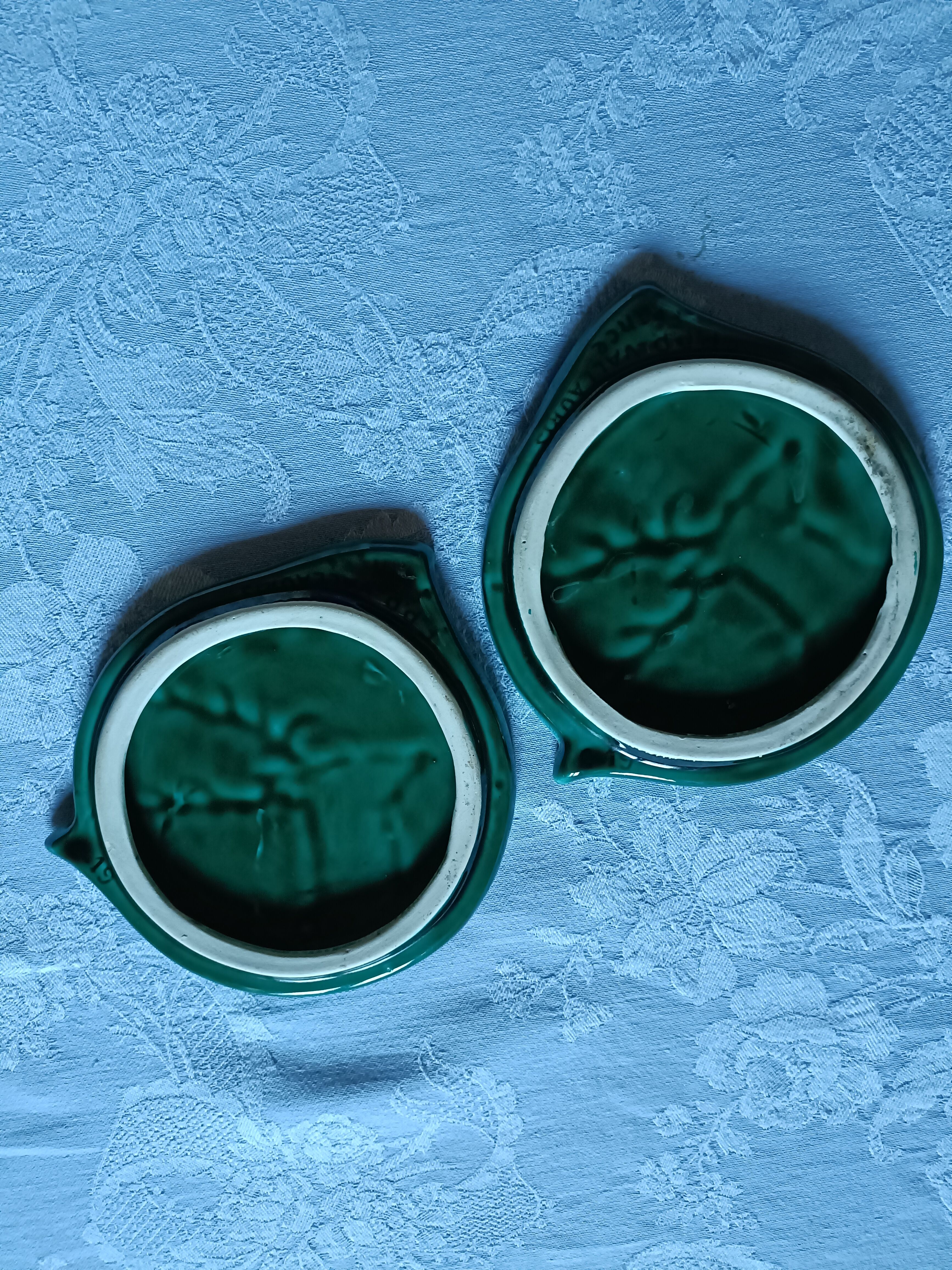 Green barbotine bottle coasters from Vallauris