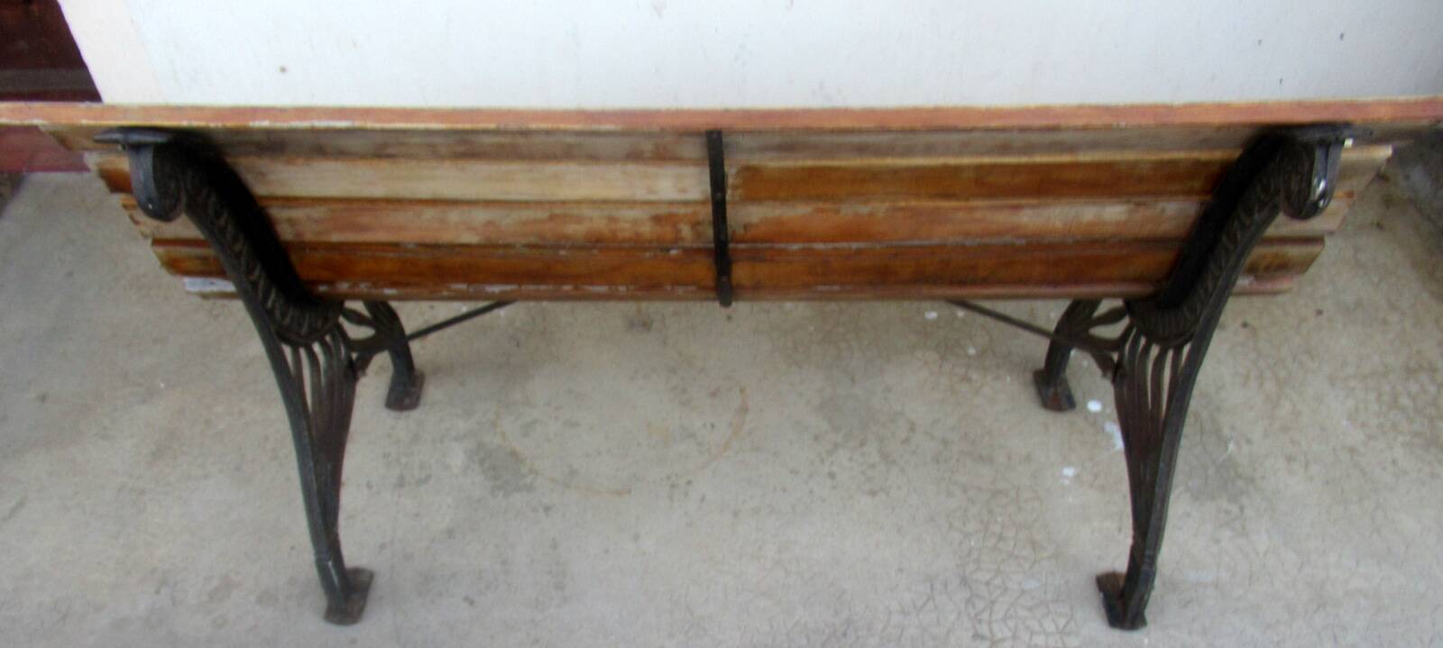 Small garden bench, with cast iron legs.