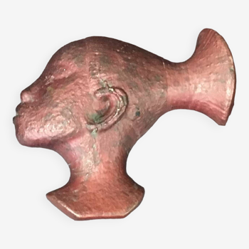 Red copper paperweight from Katanga Profile of a Mangbetu woman