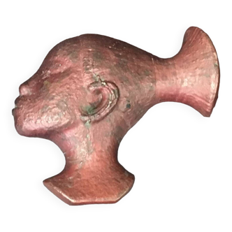 Red copper paperweight from Katanga Profile of a Mangbetu woman
