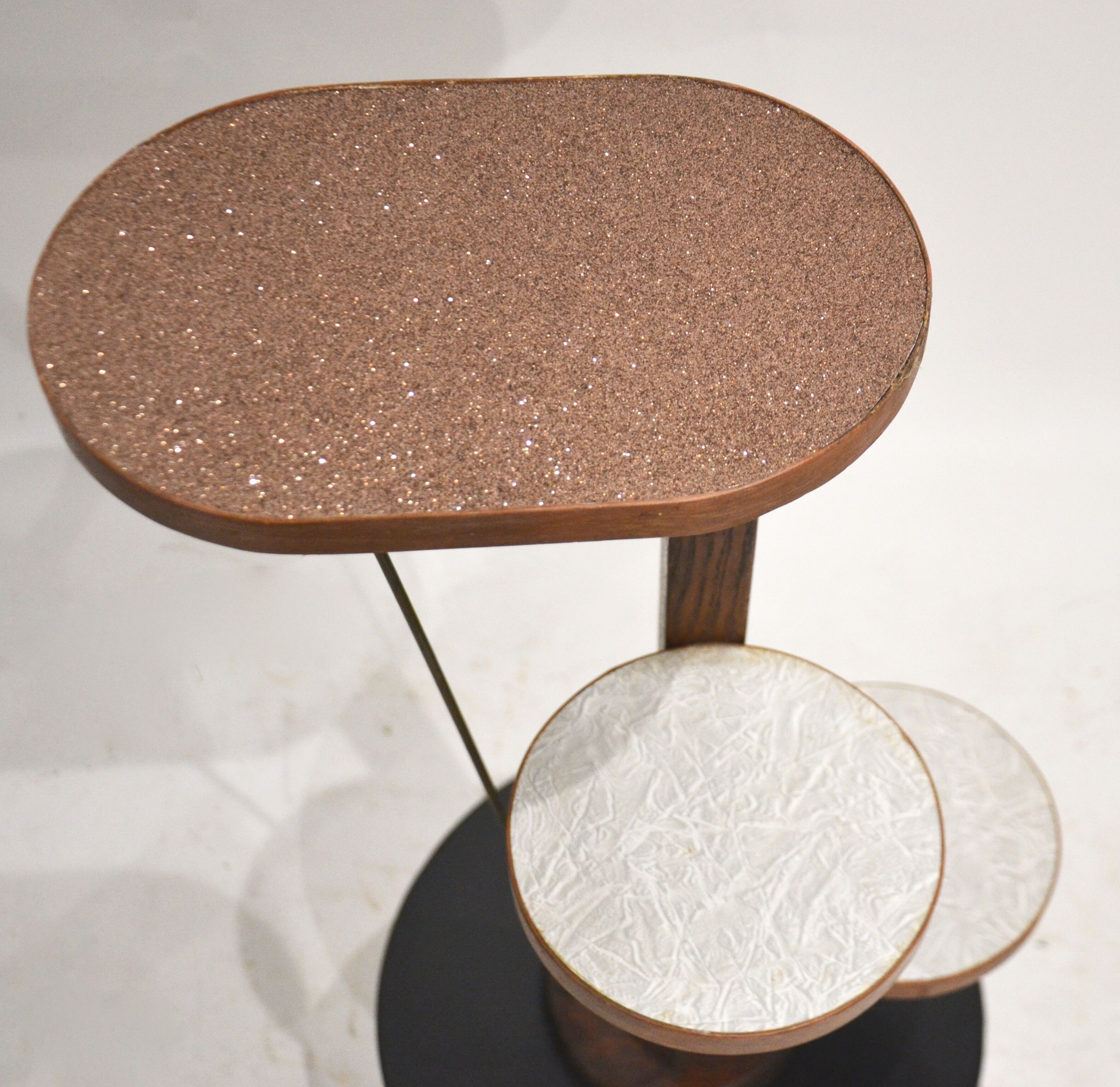 Side table wearing plants glitter