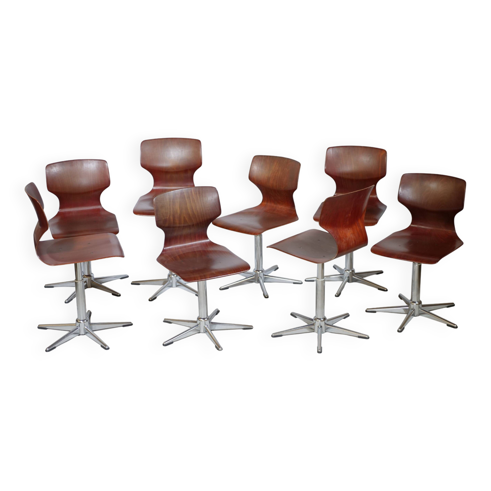 8 chaises pivotantes Flototto, années 70
