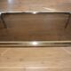 Table basse vintage en verre, laiton et chrome années 70