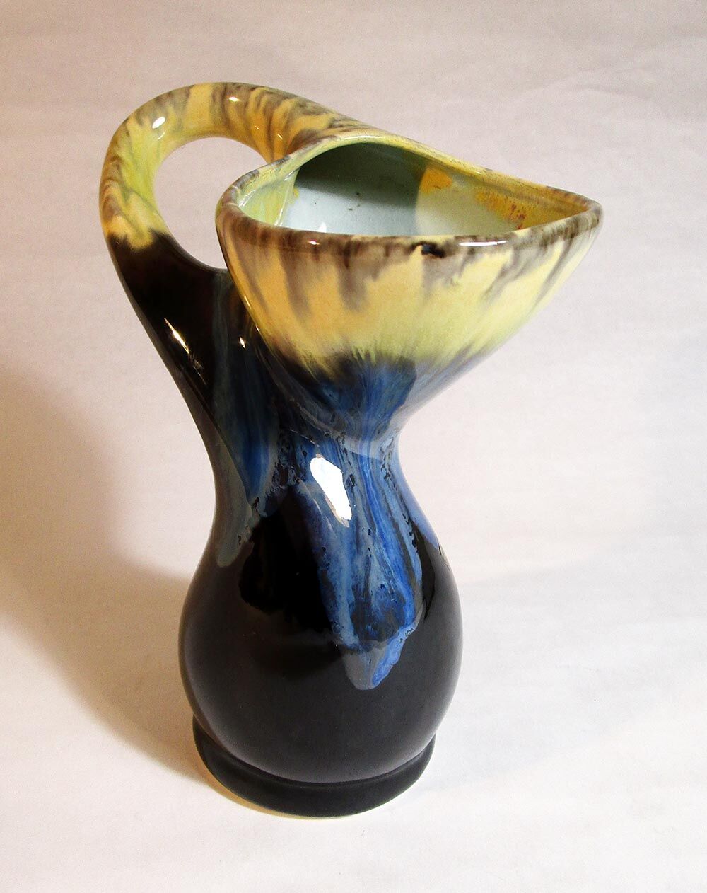 Vase with twisted handle