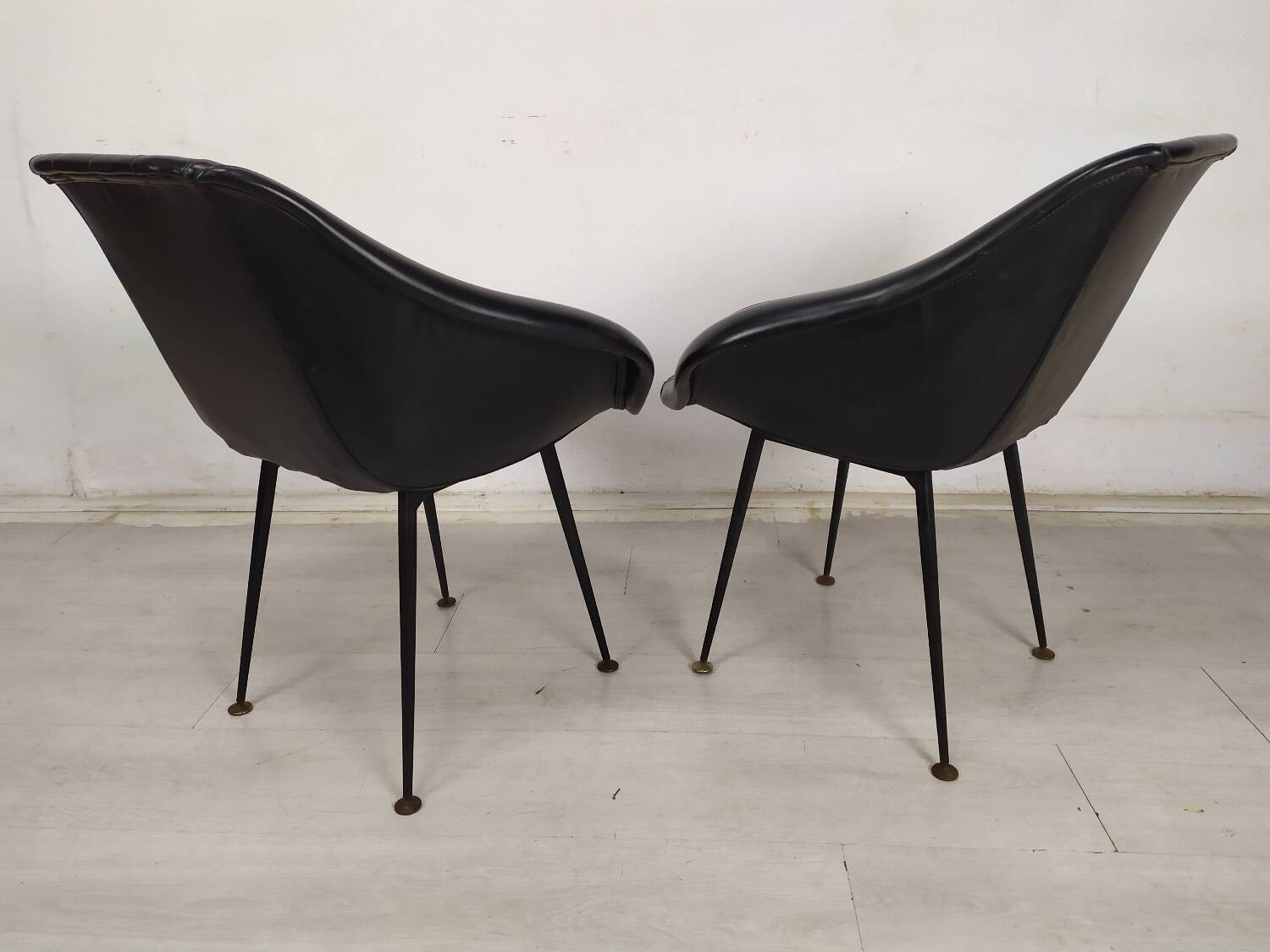 Vintage black skai armchairs