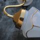 Wall light opaline and brass lantern
