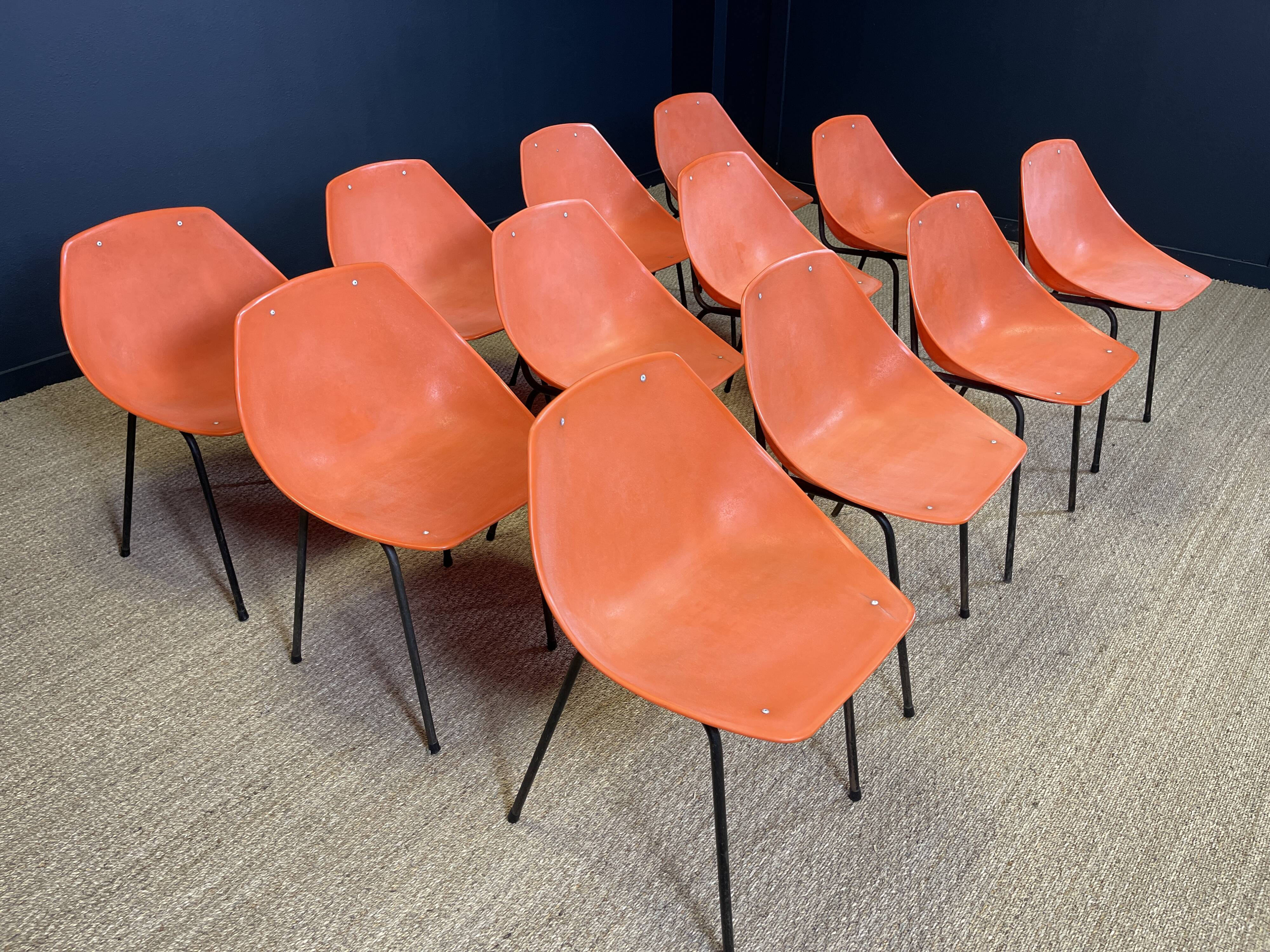 Set of 12 orange Guariche chairs