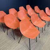 Set of 12 orange Guariche chairs