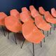 Set of 12 orange Guariche chairs
