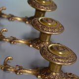Three coat hooks with brass hook