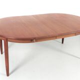 Scandinavian extendable teak dining table for 4/8 people.