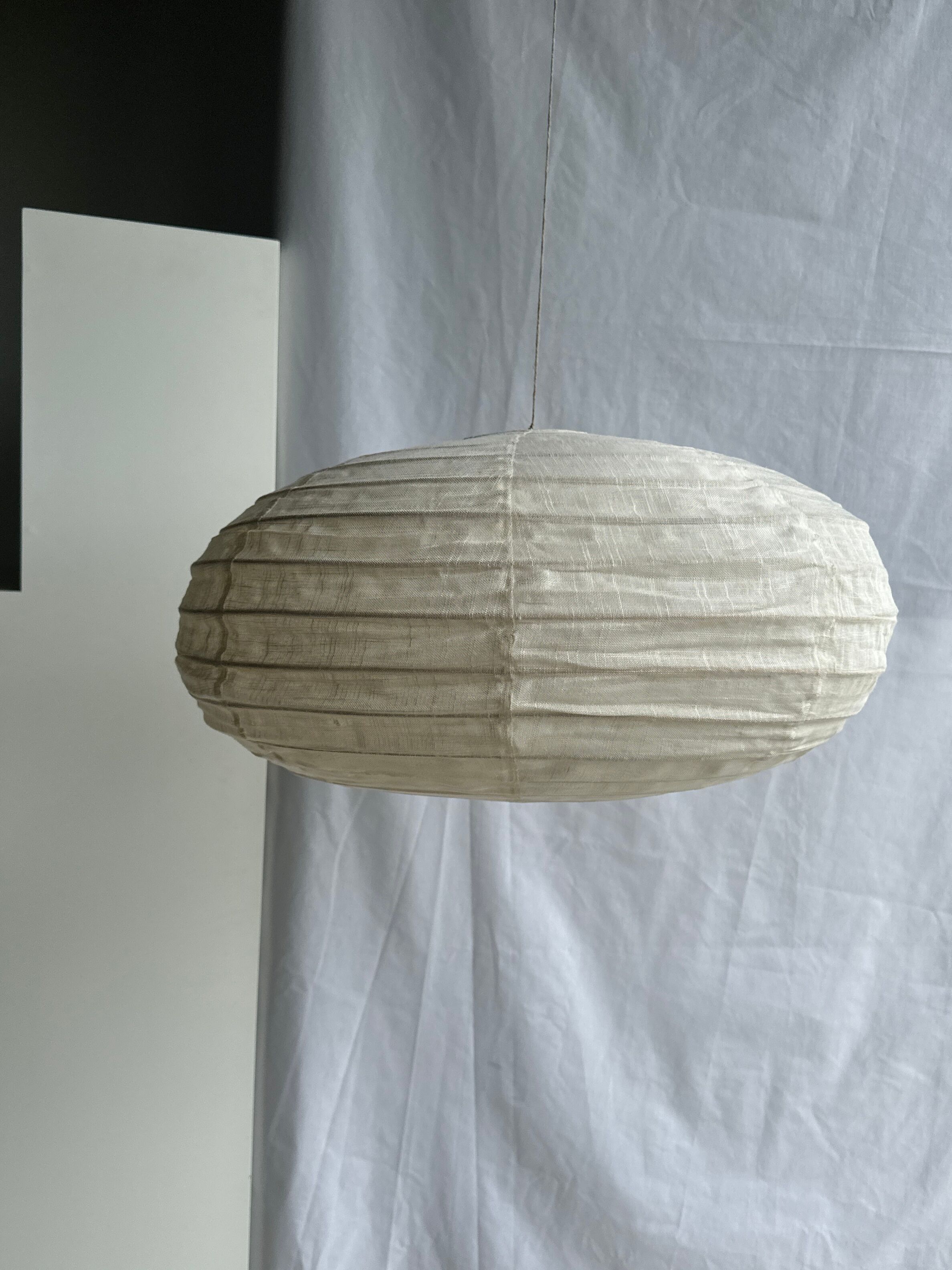 Suspension in rattan and natural linen Japanese style flattened oval h35 d60