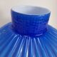 Blue opaline vase with a round handle