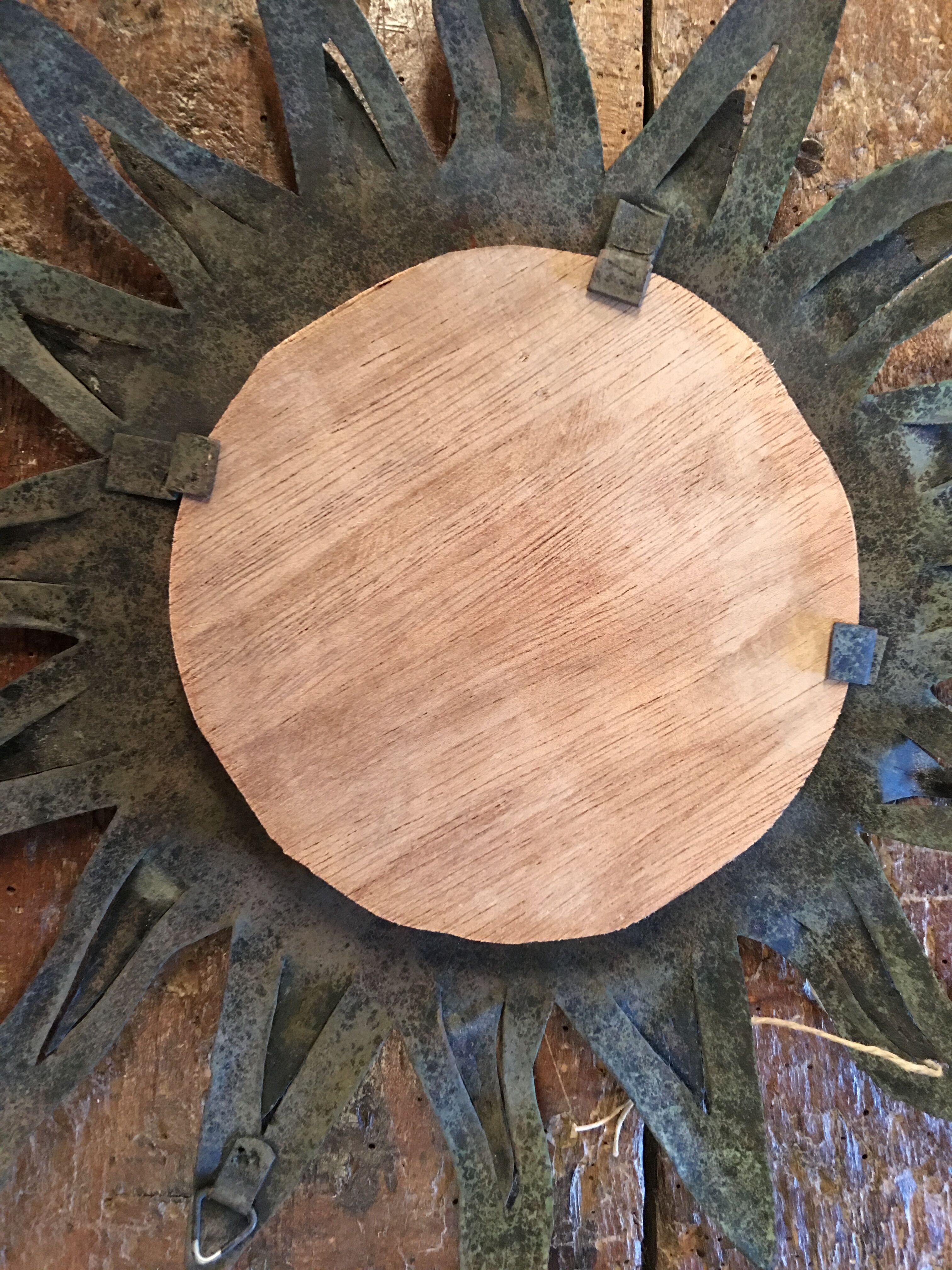Sun patinated metal mirror 35cm