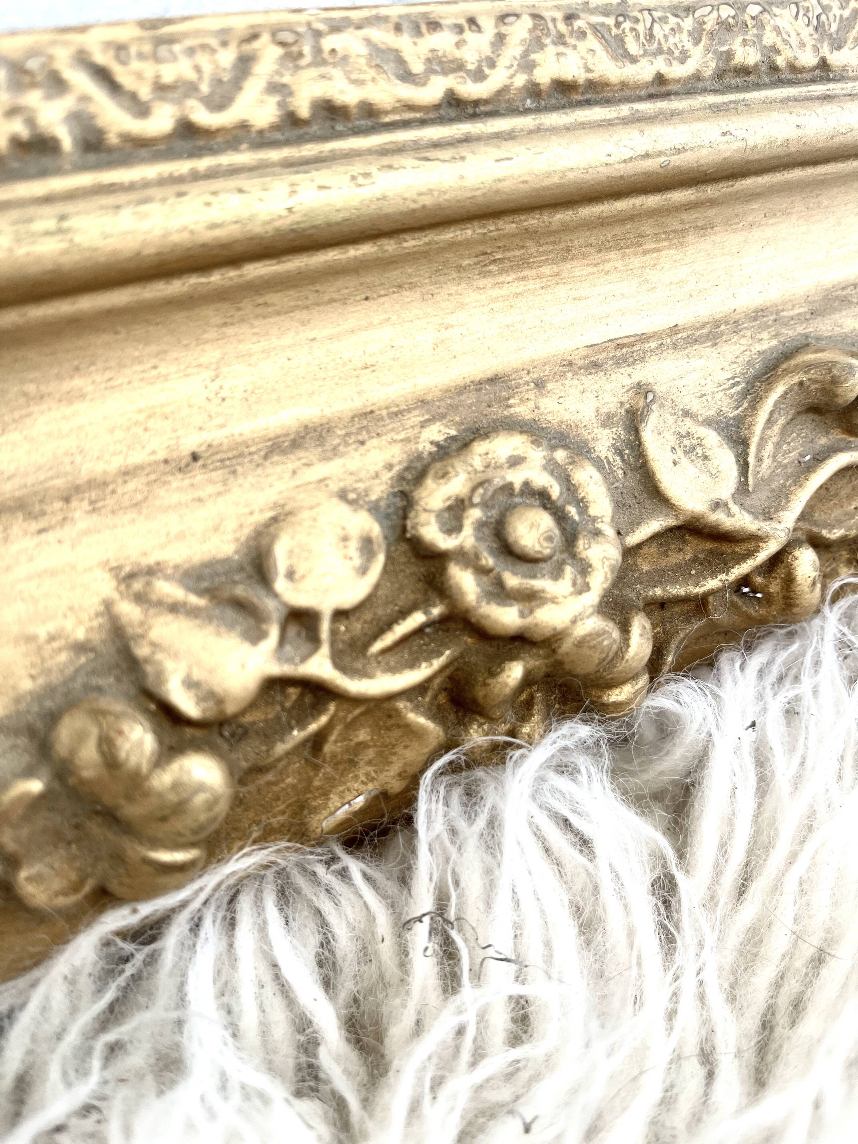 Antique gilded wooden mirror