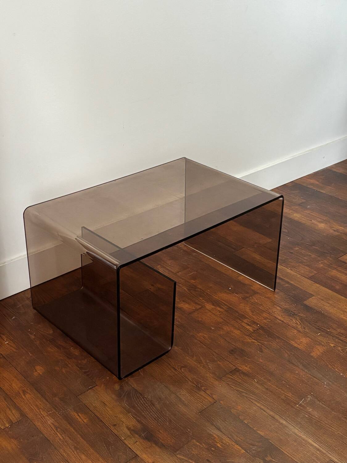 Smoked plexiglass coffee table