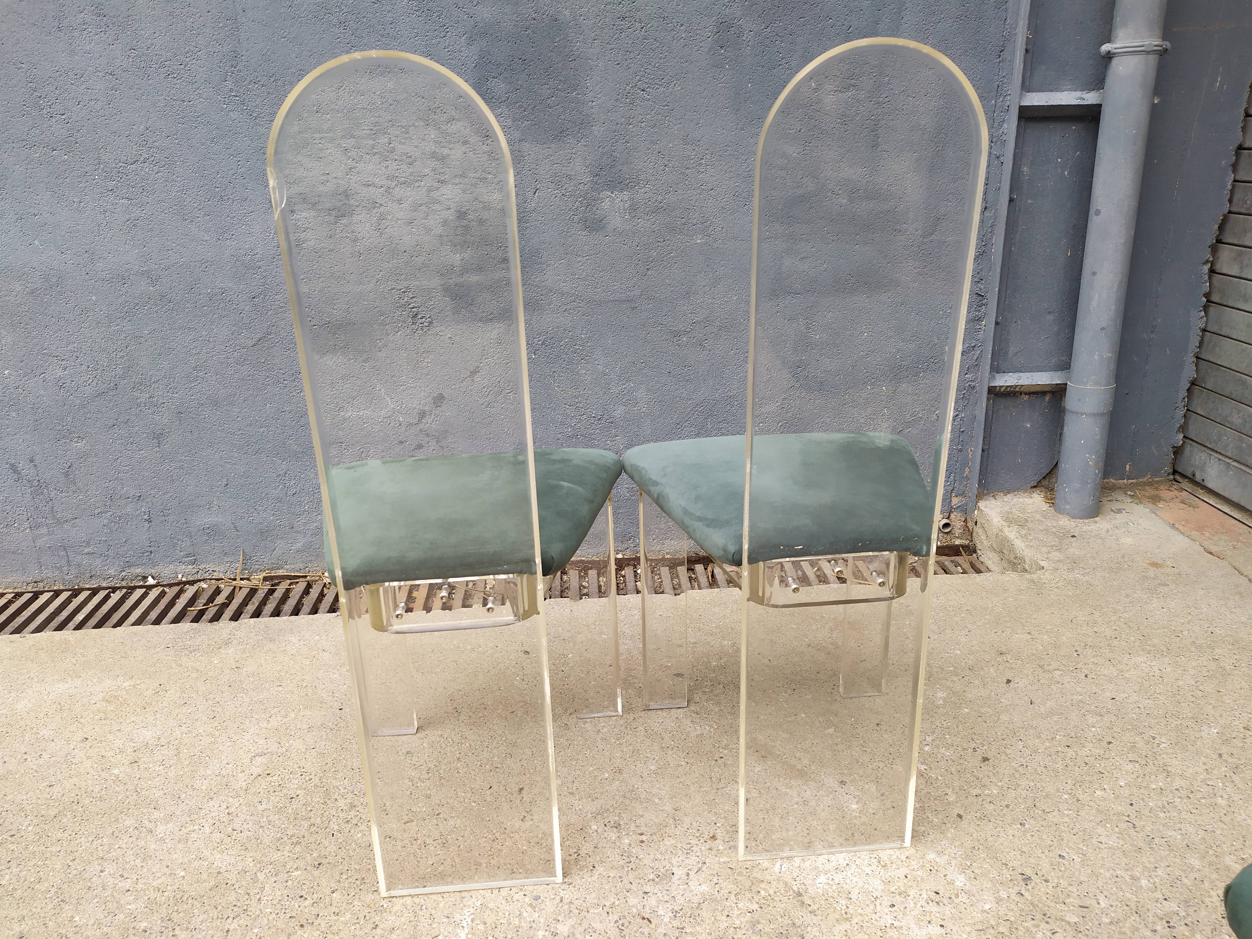 4 Plexiglas Roche and Bobois chairs