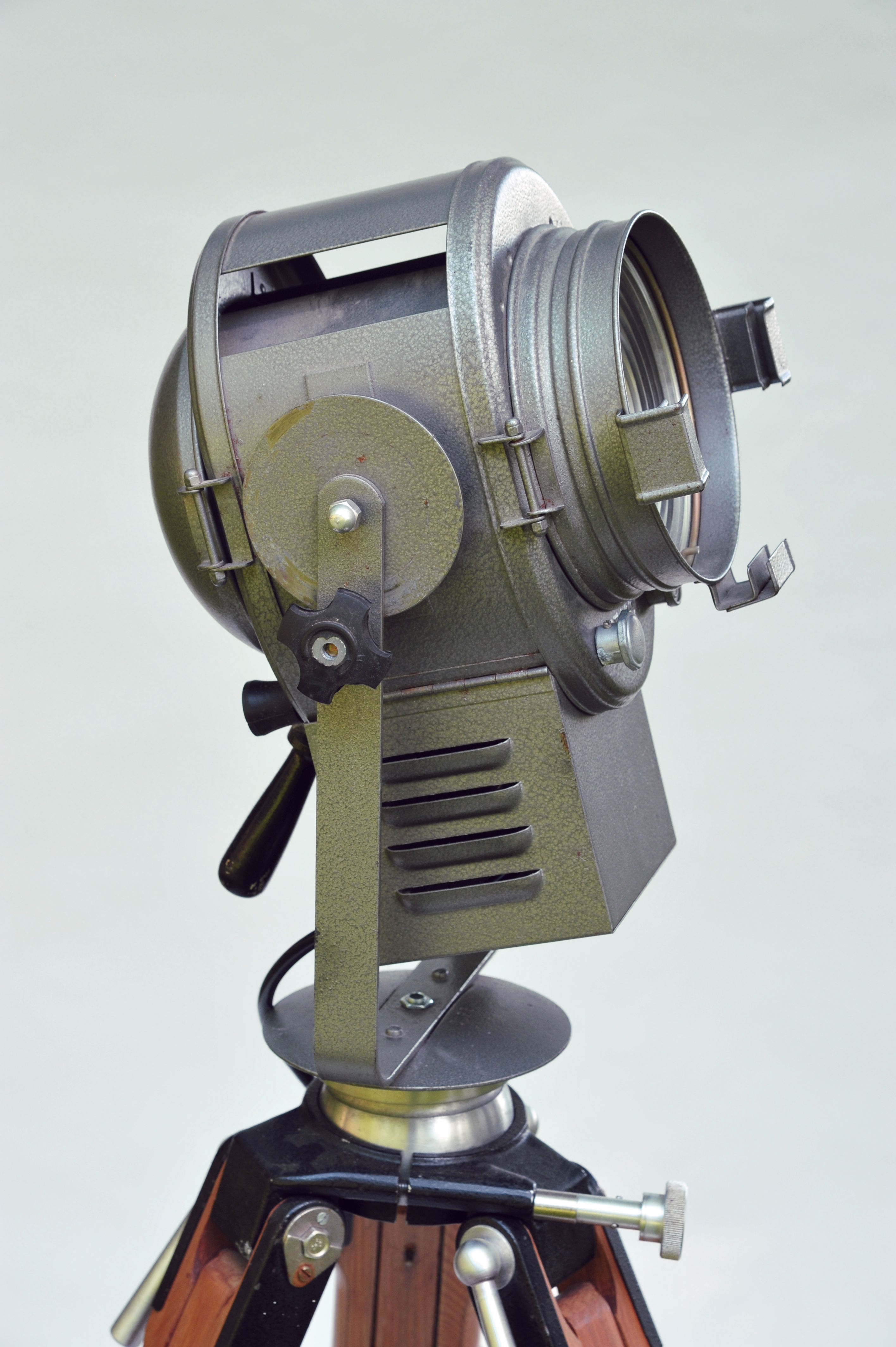 Cremer cinema projector on wooden tripod