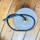 Small white and gold diabolo pendant.