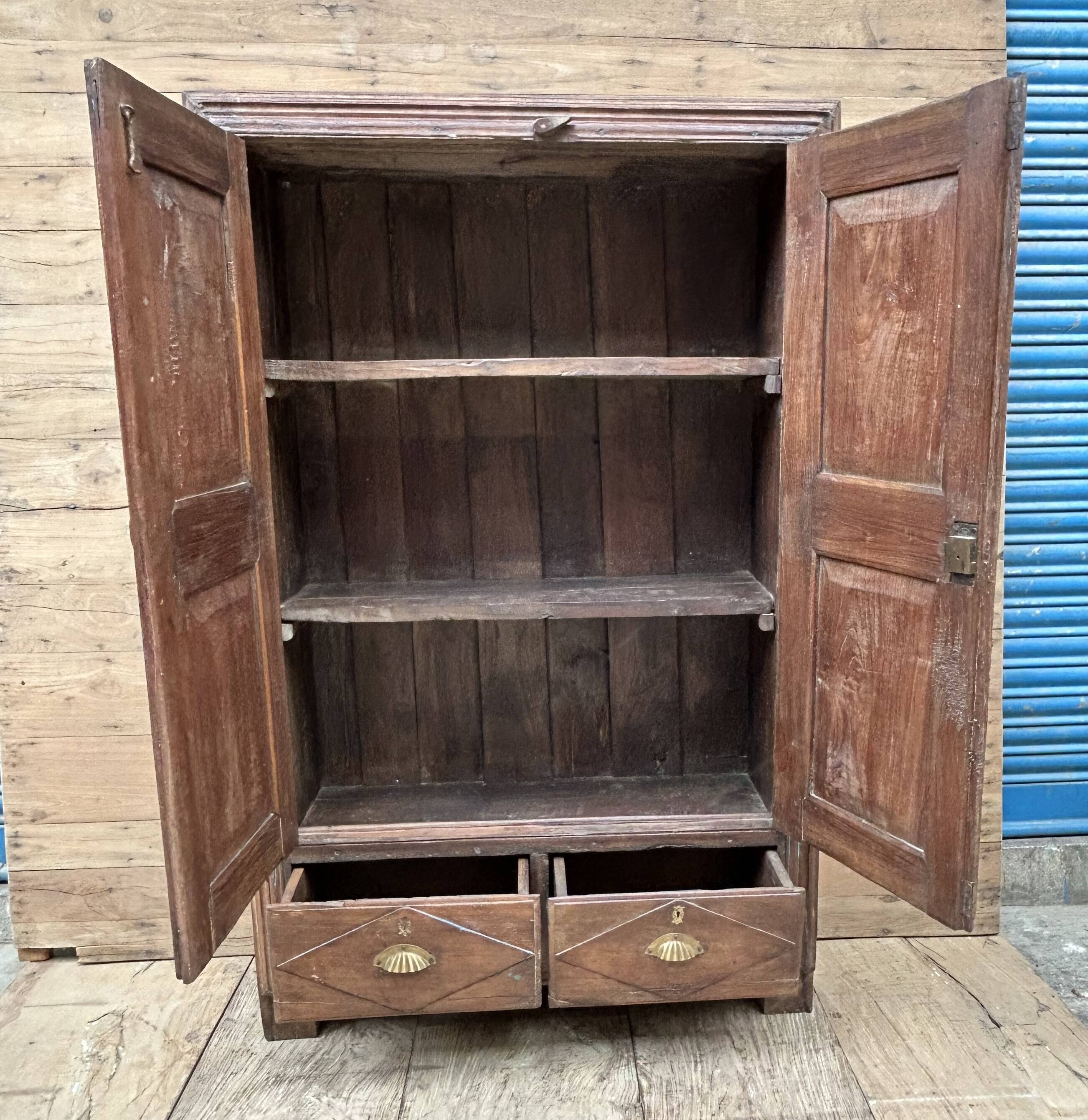 Bikaner wardrobe - Rajasthan, carved from Burmese teak.