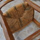 Wooden children's high chair and mulched seat