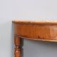 Antique walnut console with a half-moon top, Italy, 19th century.