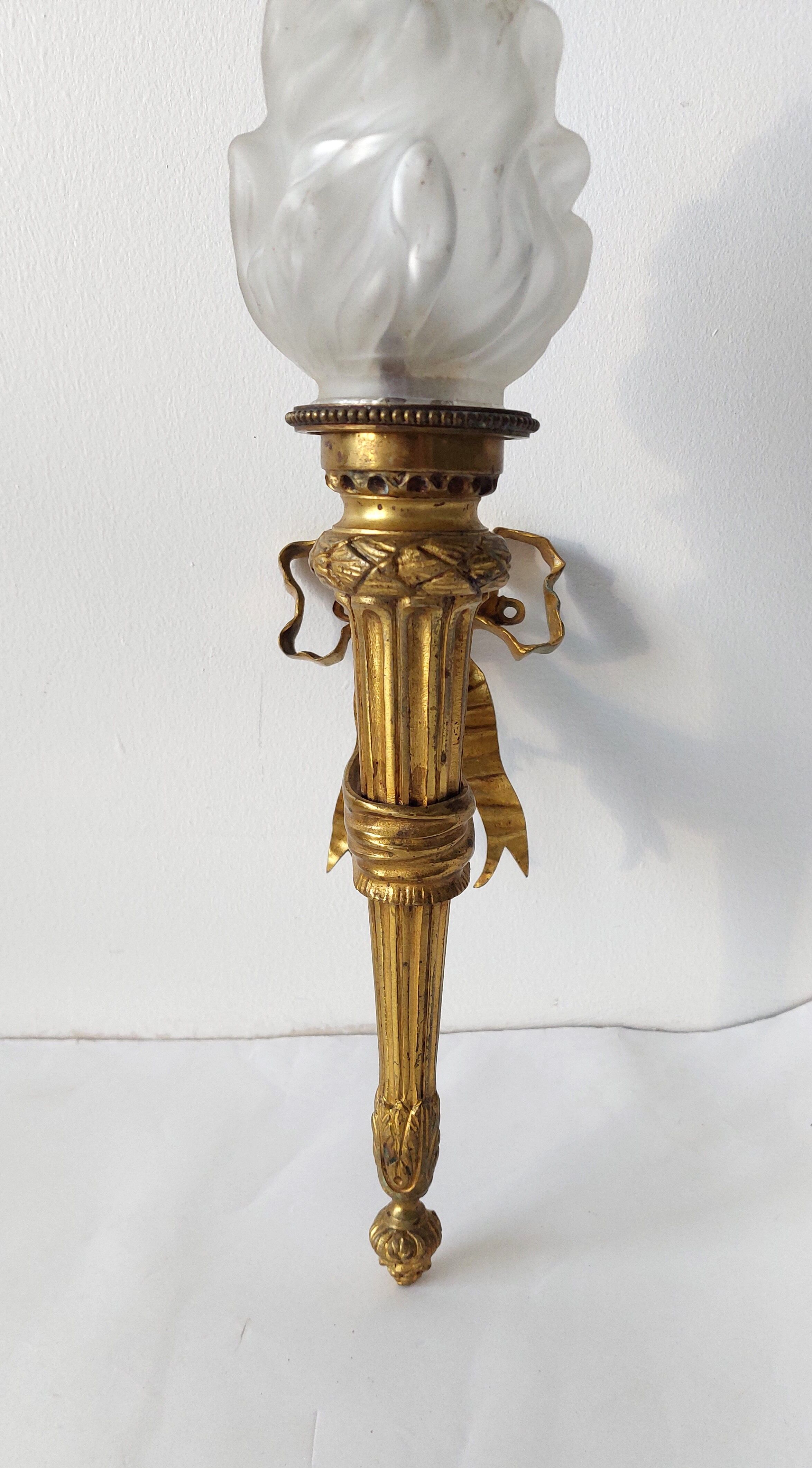 Torch wall lamp in gilded bronze Louis XVI Circa Napoleon III style.