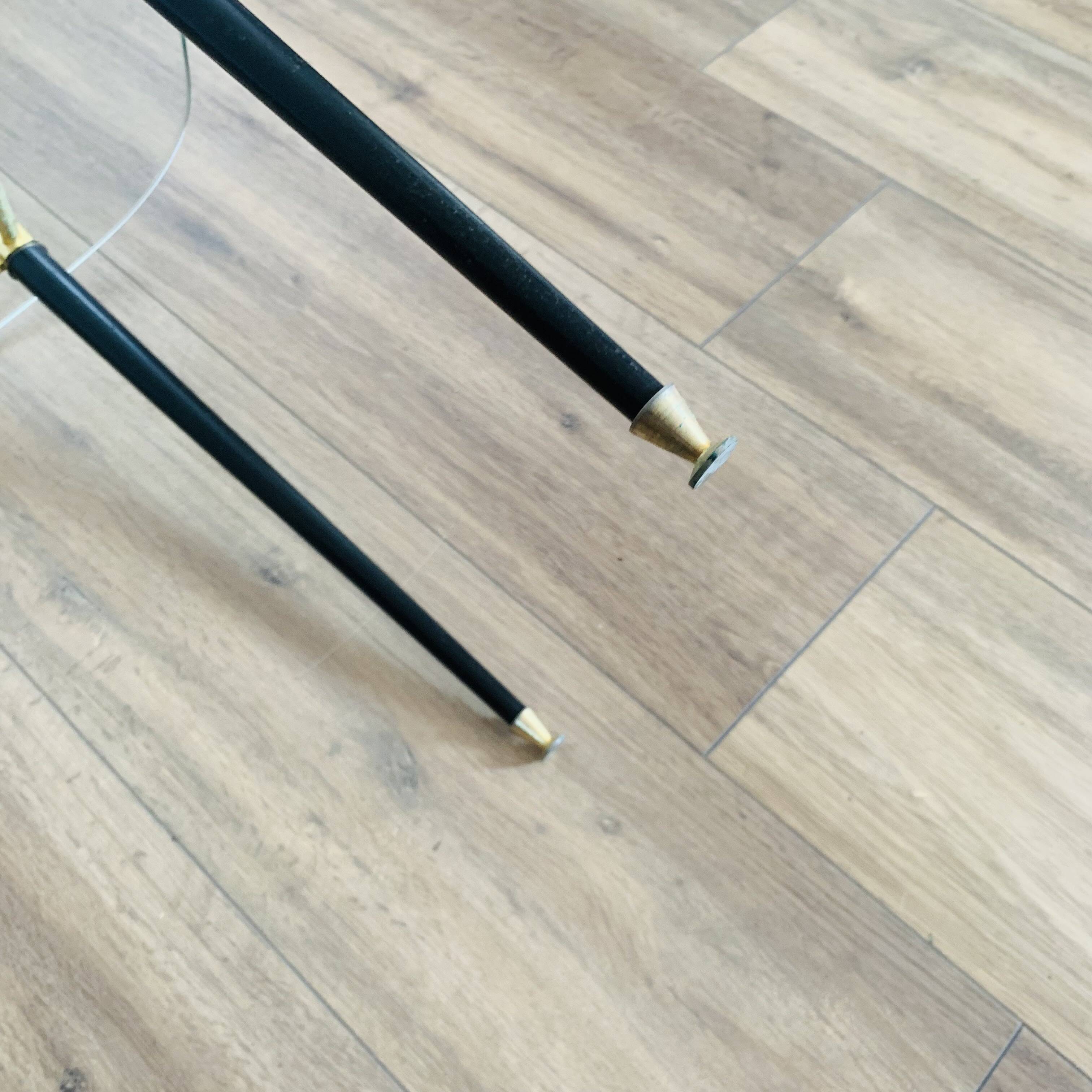 Coffee table from the 50s/60s, glass, brass, black metal.