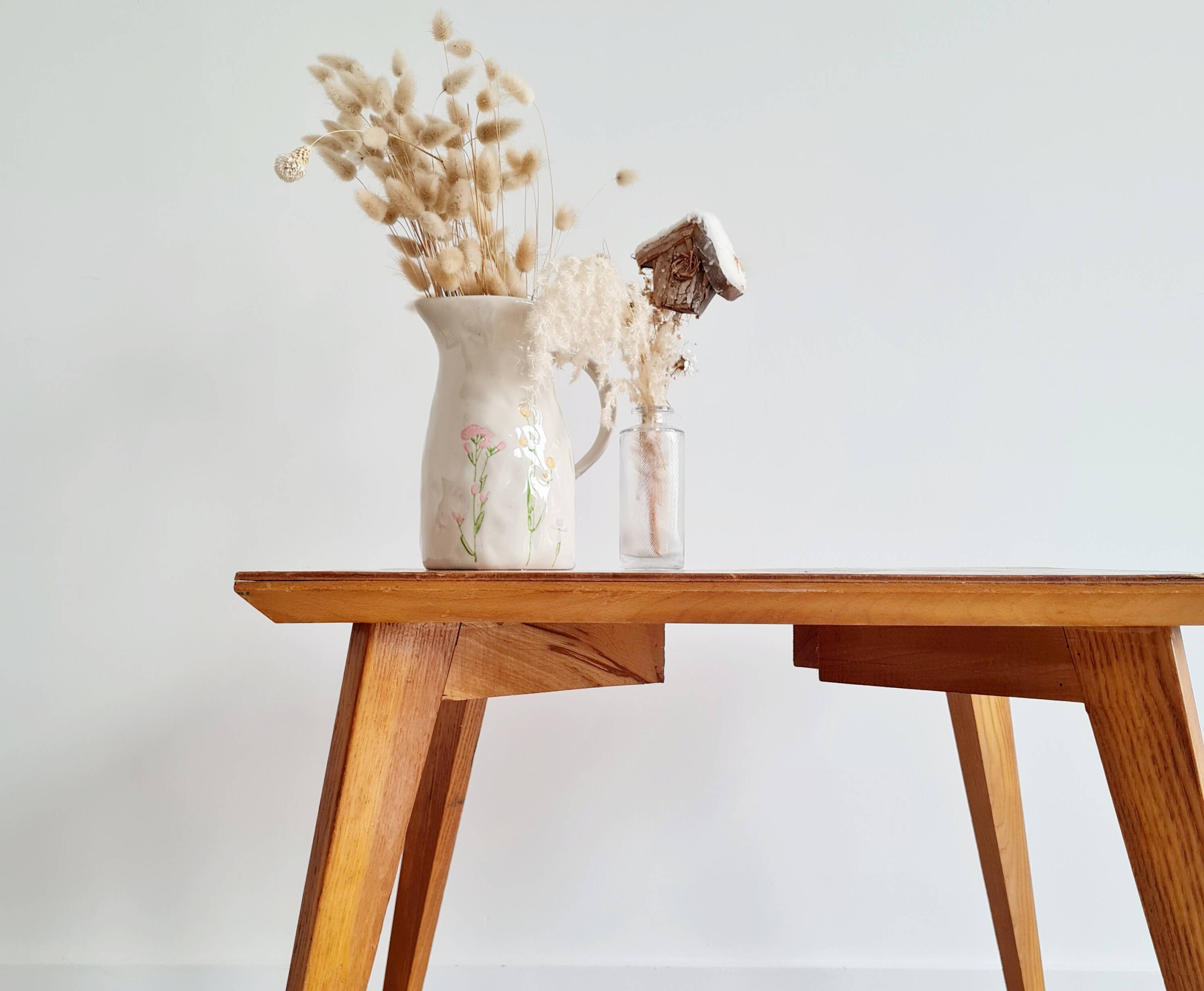 Table basse pieds compas dessus marqueté