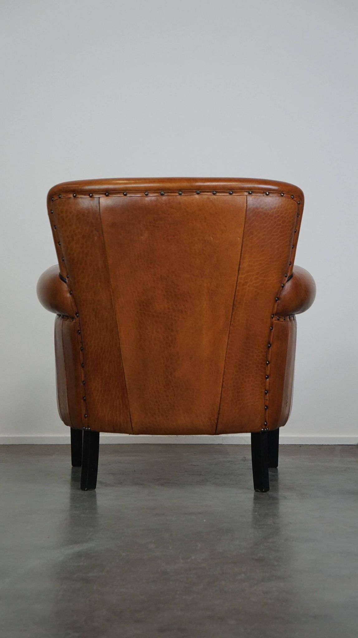 Fauteuil en cuir de mouton à l'aspect luxueux