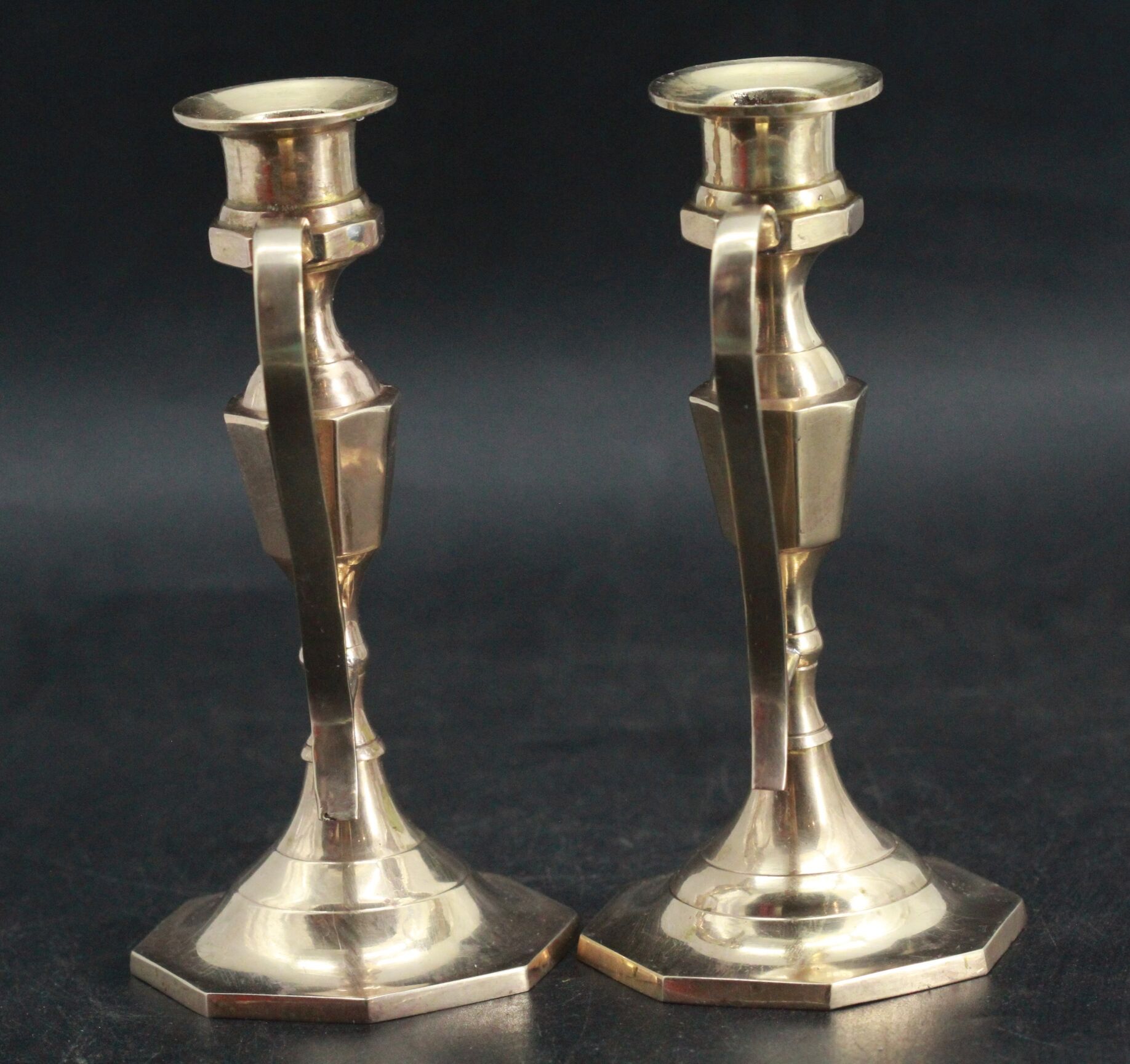 Old pair of brass candle holders