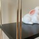Black and gold string shelf