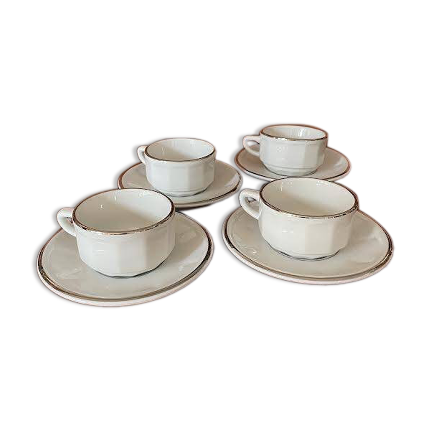 Four porcelain "bistro" cups and saucers