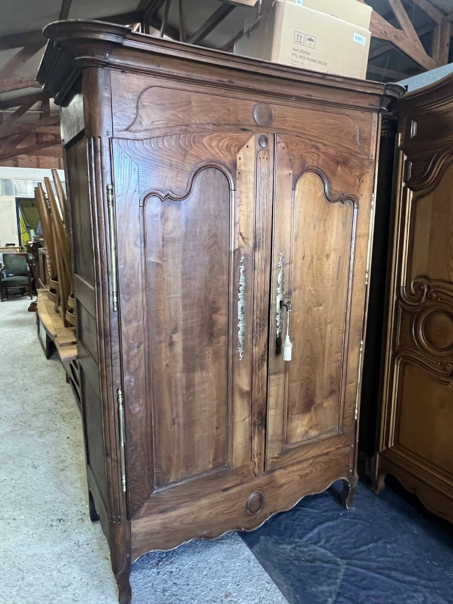 Very beautiful and old carved wooden wardrobe from the 19th century, small size, height 211 cm.