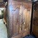 Very beautiful and old carved wooden wardrobe from the 19th century, small size, height 211 cm.