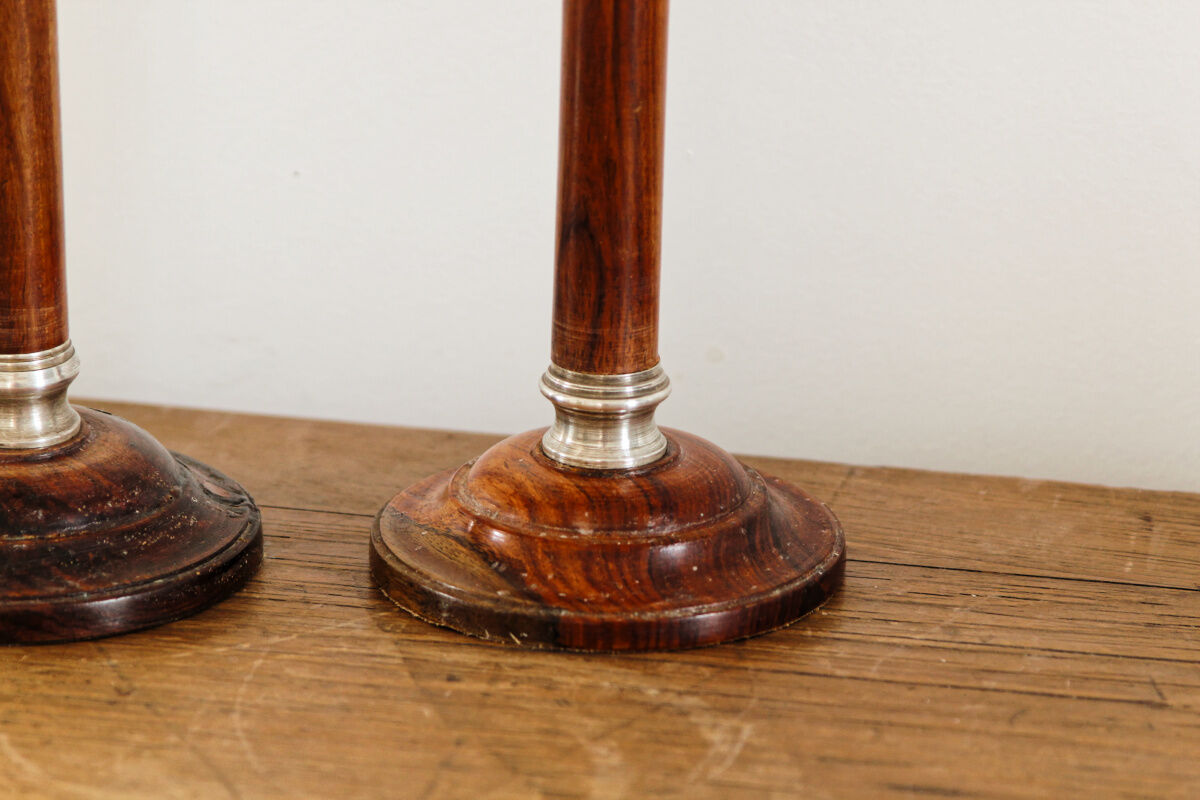 Pair of Indian candle holders, wood and silver metal
