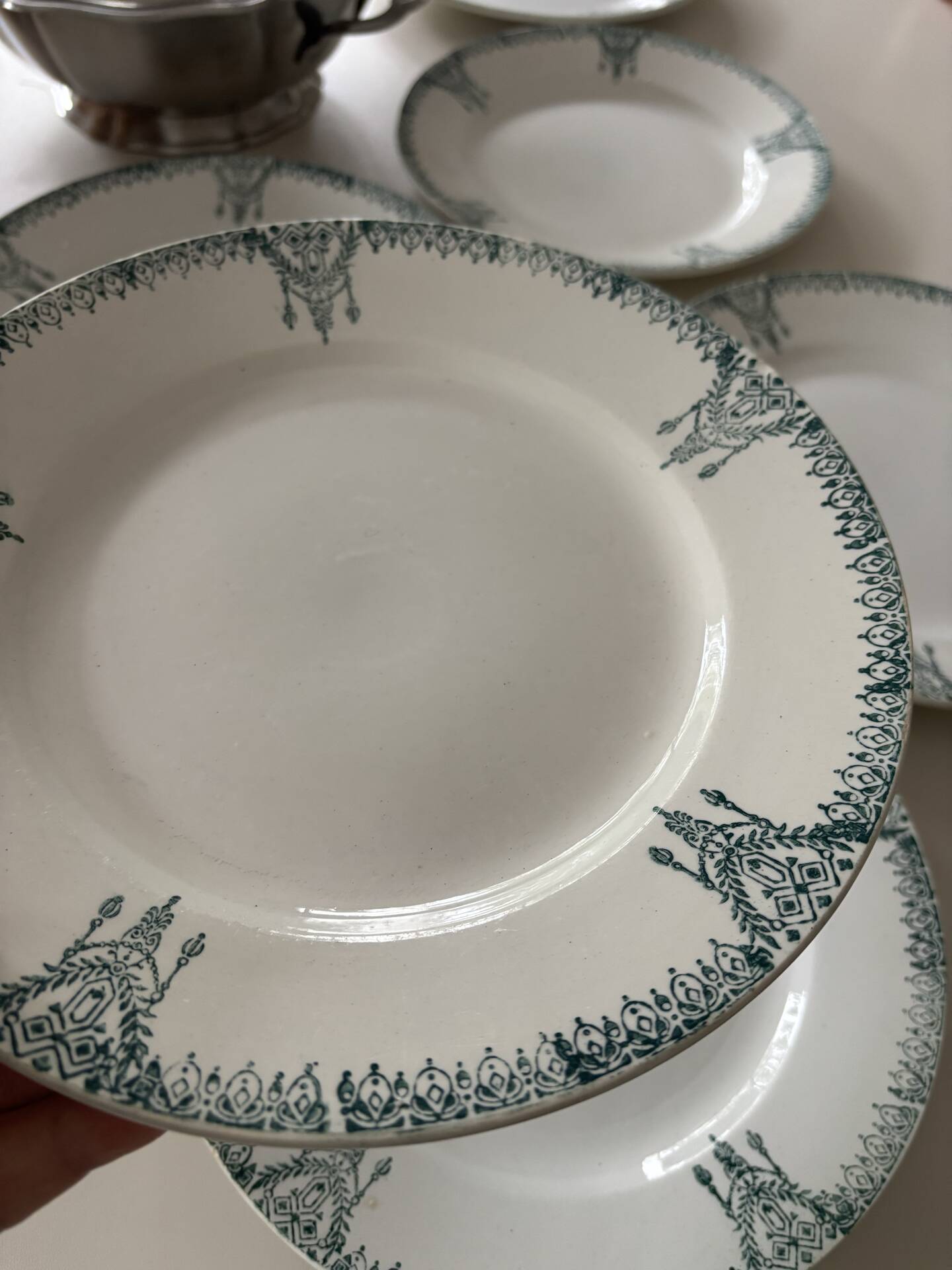 Flat plates in antique St Amand earthenware