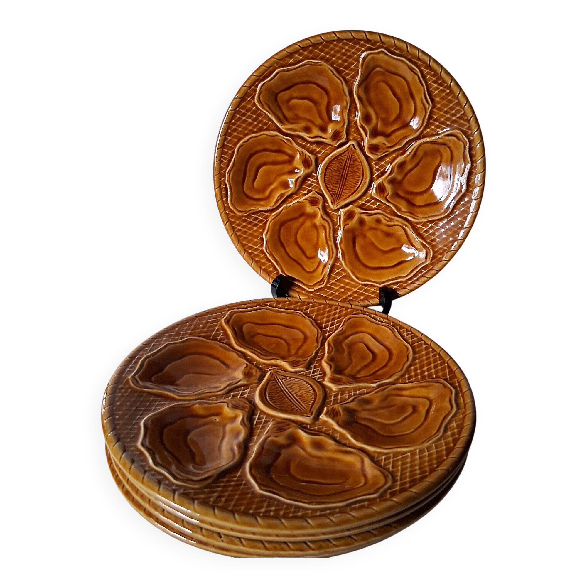 5 oyster or brown shell plates in good condition