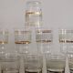 Set of 5 water glasses and 5 aperitif glasses with granite decorations and gold edging from the 1950s