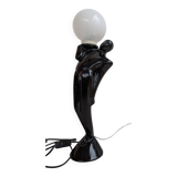 Anthropomorphic table lamp in black ceramic