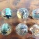 Vintage wooden solitaire game with resin balls and insects – Madaga