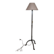 Brutalist cast iron tripod floor lamp