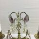 Paire de lampes girandoles en bronze et cristal
