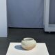 Small white ball vase tight neck in glazed speckled ceramic