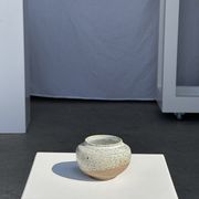 Small white ball vase tight neck in glazed speckled ceramic