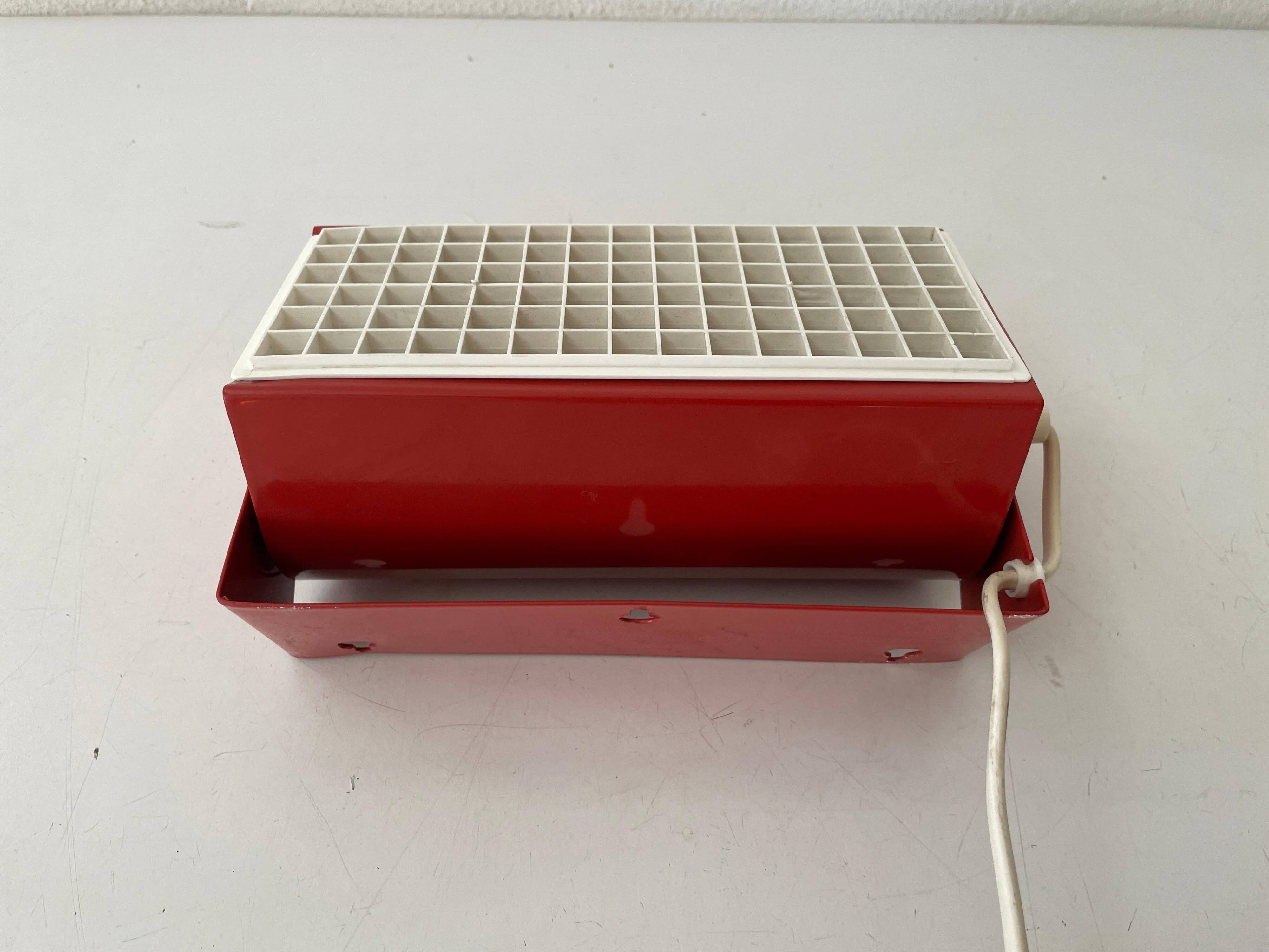 Simple red metal wall light from the AGE, 1970s, Germany.